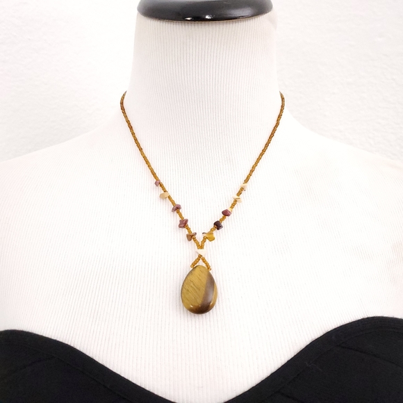 Stone Pendant on a tan Beaded Necklace - Picture 1 of 7